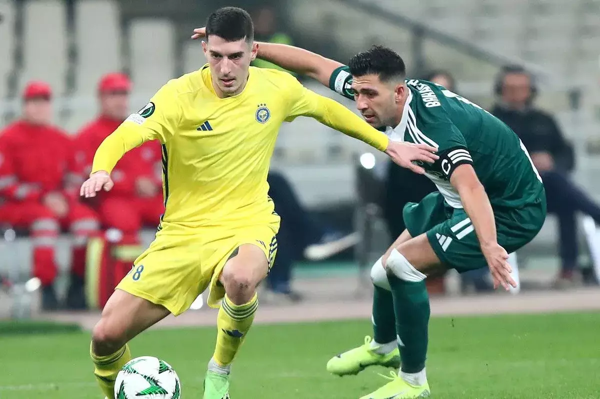 &laquo;&Sigma;ύ&gamma;&chi;&rho;&omicron;&nu;&omicron; &chi;&alpha;&phi; &omicron; &Kappa;&alpha;&nu;&epsilon;&lambda;&lambda;ό&pi;&omicron;&upsilon;&lambda;&omicron;&sigmaf;, &kappa;&alpha;&lambda;ό&sigmaf; &mu;&epsilon; &tau;&eta; &mu;&pi;ά&lambda;&alpha;, &mu;&epsilon; &tau;&rho;&epsilon;&xi;ί&mu;&alpha;&tau;&alpha;&raquo;