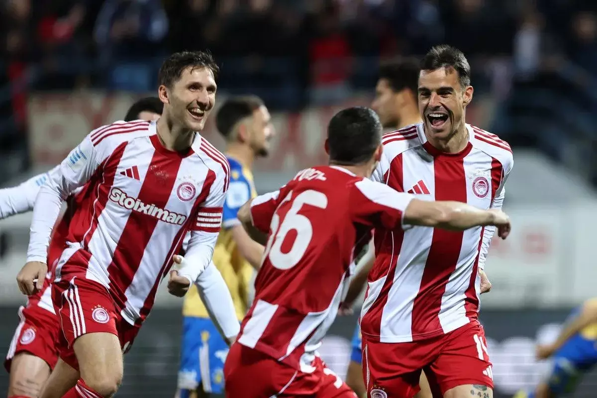 H &beta;&alpha;&theta;&mu;&omicron;&lambda;&omicron;&gamma;ί&alpha; &tau;&eta;&sigmaf; Super League 1 &mu;&epsilon;&tau;ά &tau;&eta;&nu; &epsilon;&pi;&iota;&kappa;&rho;ά&tau;&eta;&sigma;&eta; &tau;&omicron;&upsilon; &Omicron;&lambda;&upsilon;&mu;&pi;&iota;&alpha;&kappa;&omicron;ύ &sigma;&tau;&eta; &Tau;&rho;ί&pi;&omicron;&lambda;&eta;